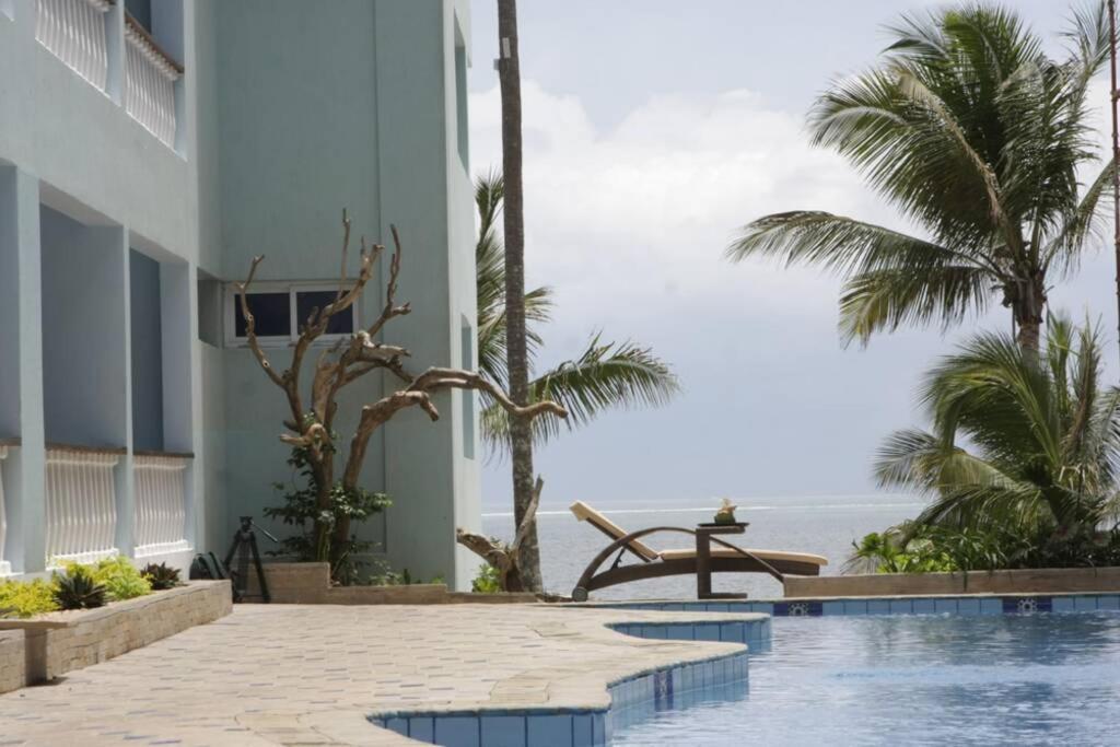 Cowrie Beach Haven Studio Apartment Mombasa Bagian luar foto