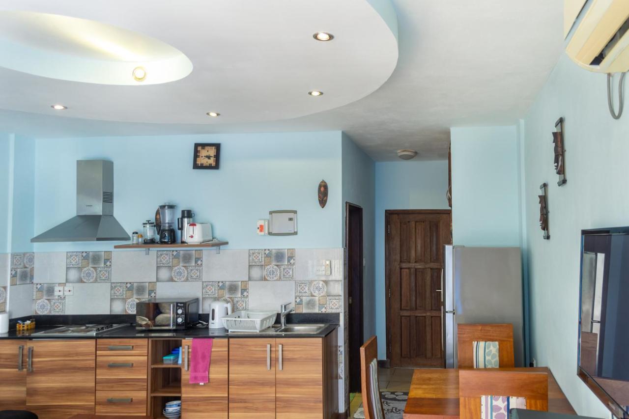 Cowrie Beach Haven Studio Apartment Mombasa Bagian luar foto