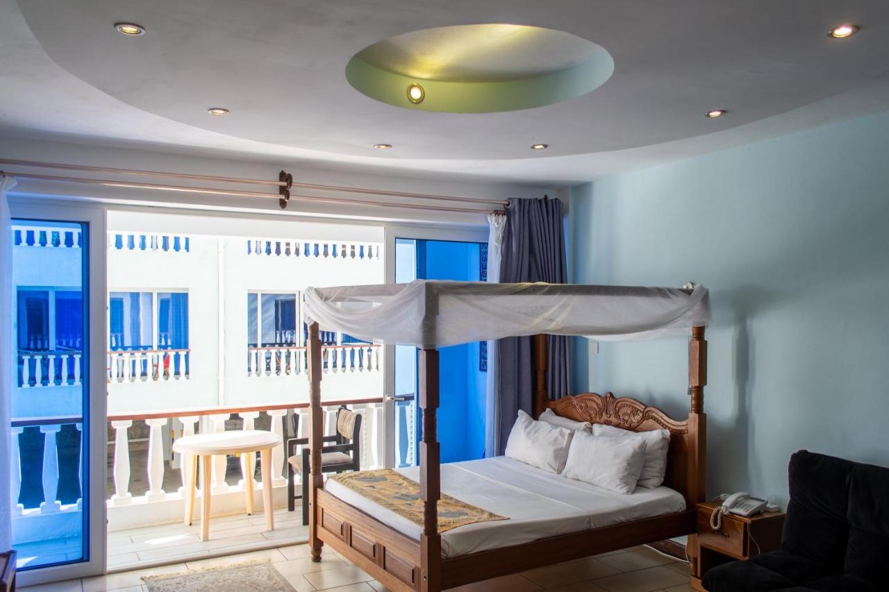 Cowrie Beach Haven Studio Apartment Mombasa Bagian luar foto